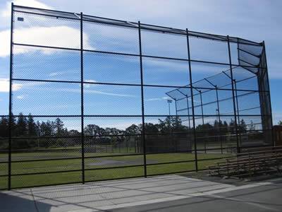 A chain link security fence of high height and small size of mesh is used in large stadium.