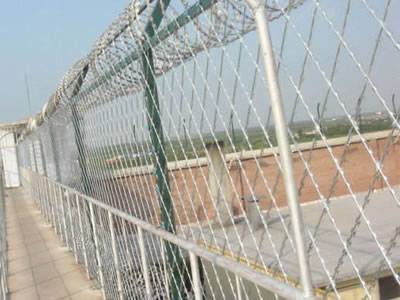 Welded stainless steel razor wire is installed in the prison.