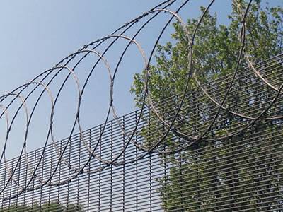 stainless steel razor wires are installed at the top of 358 mesh fence.
