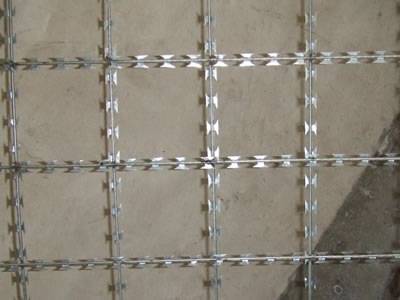 A piece of welded razor wire with square meshes.